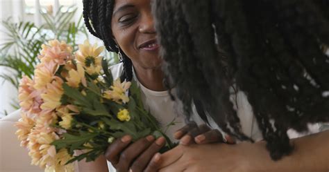 A Woman Receiving a Bouquet of FlowersFree Stock Video
