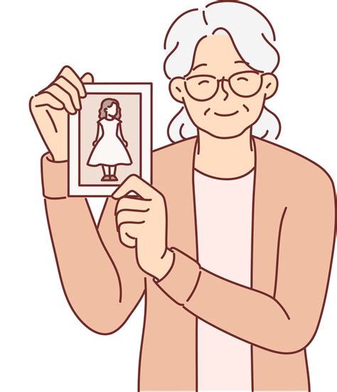 Elderly woman shows photo of little girl and smiles, nostalgic and