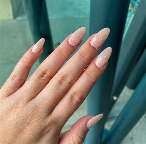 Nude dip with a layer of holo glitter! Products listed in the comments