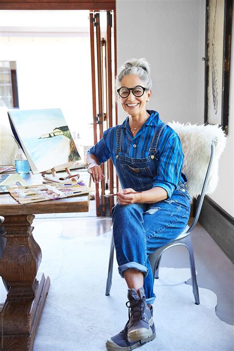 "Artist Portrait Of Mature Woman Smiling In Her Art Studio" by Stocksy
