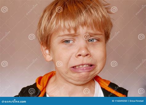 Close Up of Boy Making a Disgusted Facial Expression Stock Photo ...