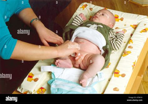 Changing babys nappy Stock Photo: 1684503 - Alamy
