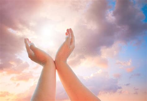 Hands reaching for the sky stock photo. Image of person - 103122398