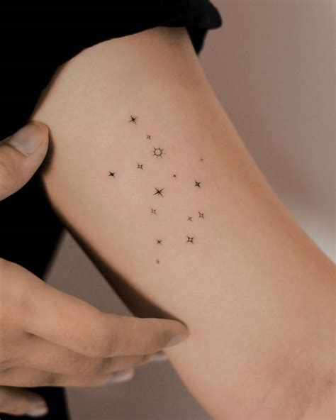 Minimalistic style Virgo constellation tattoo located