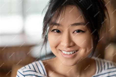 premium photo cute face close    cute asian young girl