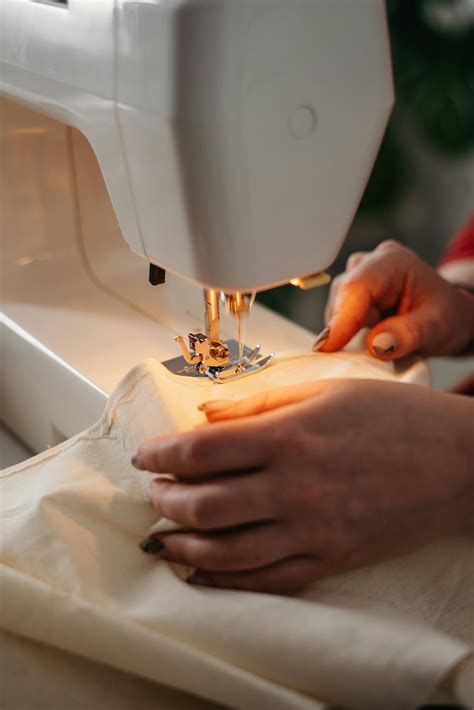 person   sewing machine  stock photo