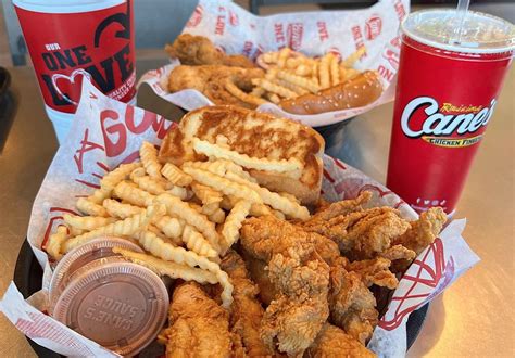 raising canes opens  orlando location west orange times observer