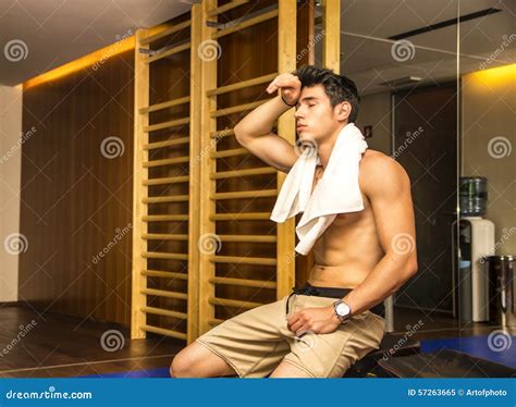 muscular shirtless male athlete drying sweat  stock image image