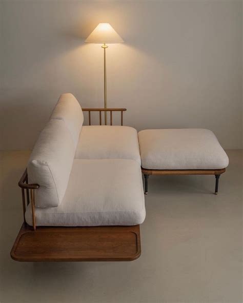 Minimalist White Couch with Lamp and Table