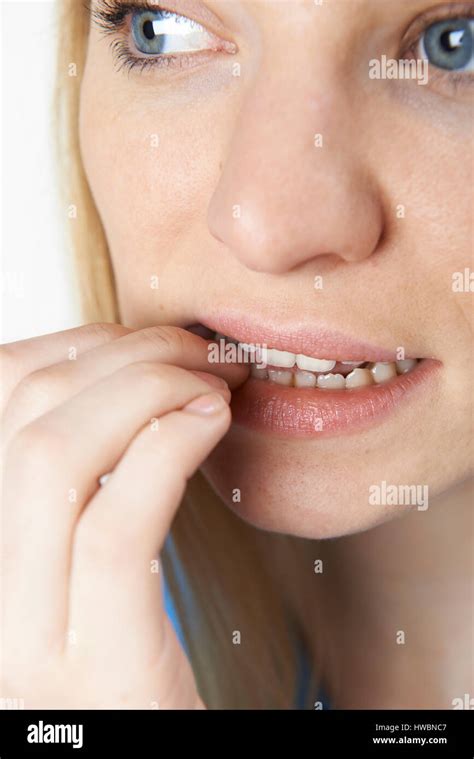 Biting fingernails hi-res stock photography and images - Alamy