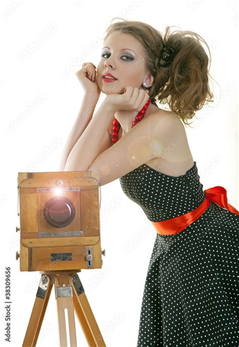 Девушка со старинной камерой Stock Photo | Adobe Stock