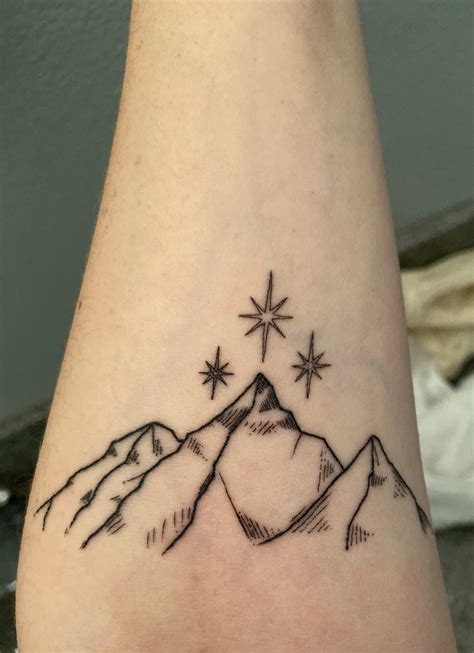 My first tattoo & based on symbol on the Night Court from the book ...