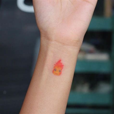 20 Tiny Wrist Tattoos - Brit + Co