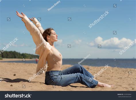 naked girl sitting  beach summer stock photo  shutterstock