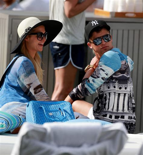 Paris Hilton spends the day in and out of the pool in Miami December 8
