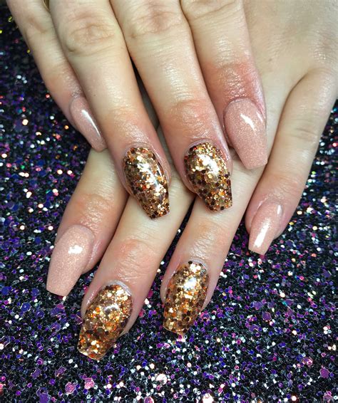 Sculpted nude shimmer Acrylics with gold glitter details 💅🏻 | Trendy
