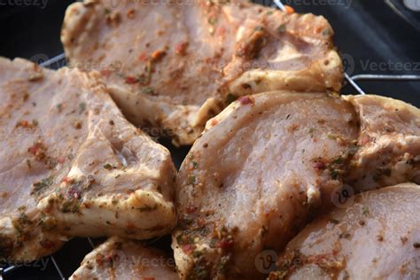 Raw pickled pork meat. Pork meat prepared for barbecue. Raw kebab