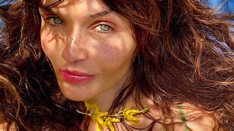 Helena Christensen, 53, wows in cut-out swimsuit during dreamy mountain ...