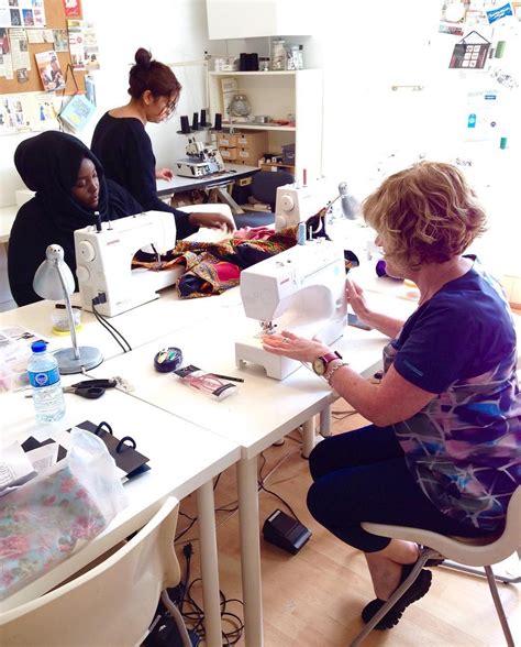 Two Women Sewing at a Table