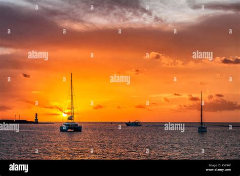 Formentera, Balearic Island, Spain. Spectacular and intense sunset with its colors orange and ...