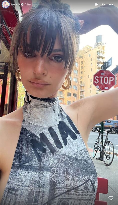 Emily Ratajkowski rocks underboob-baring newsprint dress