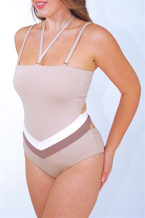 Full coverage, sculpting one piece swimsuit with convertible straps