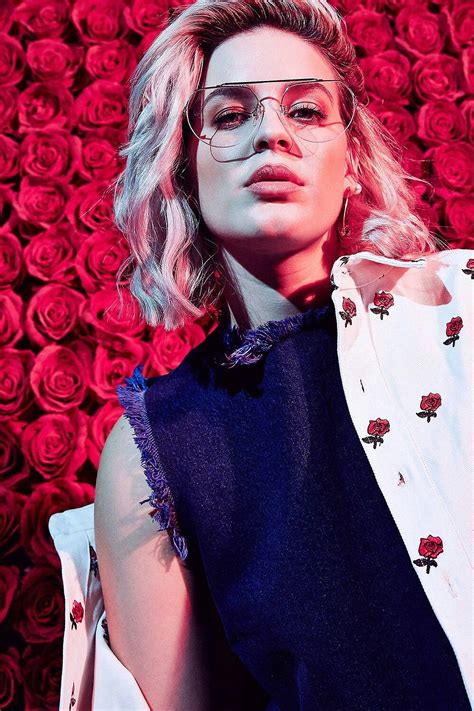 Download Anne Marie Red Roses Wallpaper | Wallpapers.com