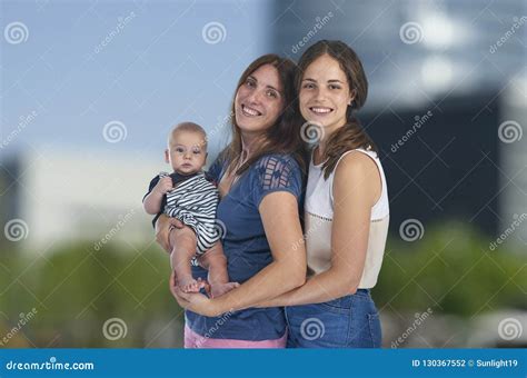 Lesbian Love, Young Lesbian Mothers with Their Baby. Homosexual Stock ...