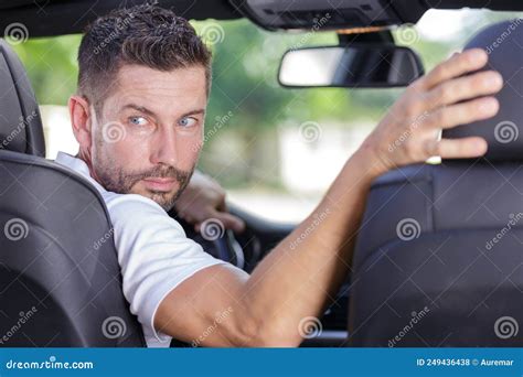 man reversing car stock photo image  journey smiling