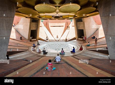 AUROVILLE, INDIA. Meditation at the lotus pond underneath the ...