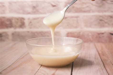 Condensed Milk in a Bowl Close Up, Stock Image - Image of sticky ...