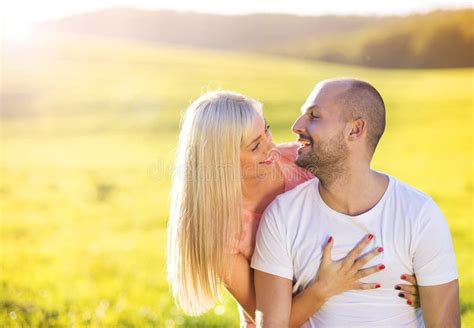 Couple in love hugging stock image. Image of love, green - 50041983