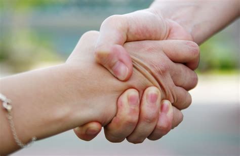 holding hands   science  symbolism explained