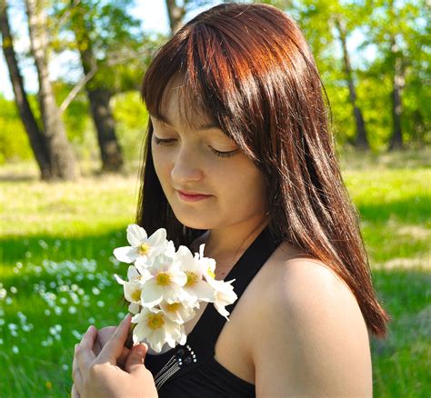 A Girl With White Flowers Free Stock Photo - Public Domain Pictures