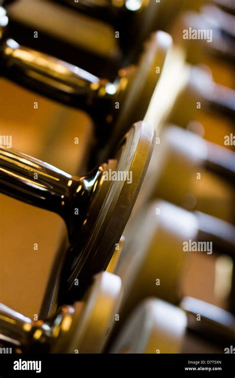 Set of weights in a small gym Stock Photo - Alamy