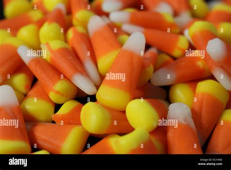 Close up of a pile of candy corn Stock Photo - Alamy