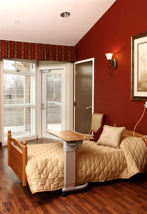 nursing home design, nursing home decor, red wall, red room, wood floor