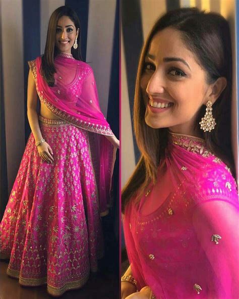 Yami Gautam wearing hot pink lehanga choli bridal by Anita Dongre