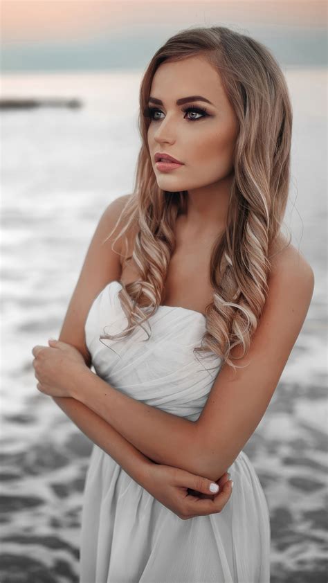 1440x2560 Women Beach Side White Dress Blonde Hairs 4k Samsung Galaxy