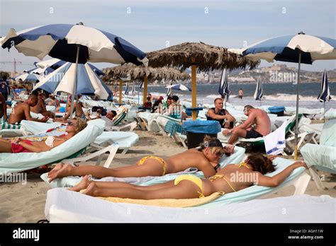 Young people relaxing at the Bora Bora Disco Beach, Ibiza, Spain Stock ...