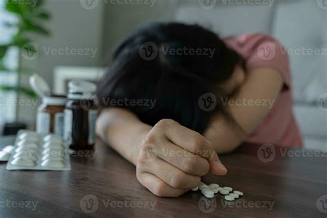 asian woman use pills overdose, stressed, sad, drug abuser, drug addict