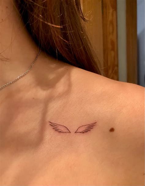 Simple Small Wings Tattoo