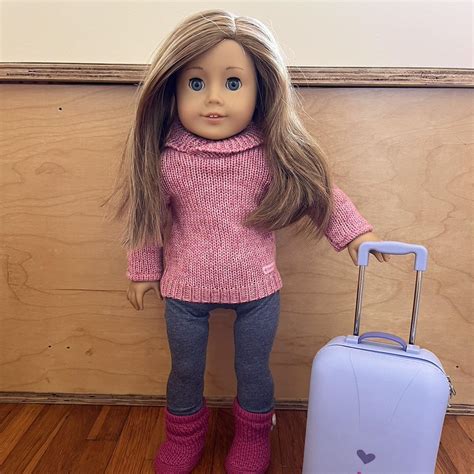 American girl doll + suitcase + clothes - Depop