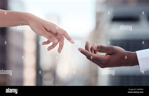 People, hands and reaching for connection outdoor for compassion, unity and support with ...