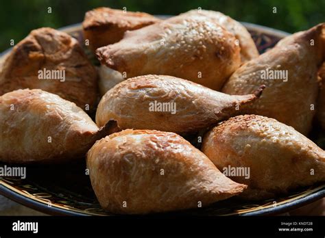 Uzbek traditional pastry samsa Stock Photo - Alamy