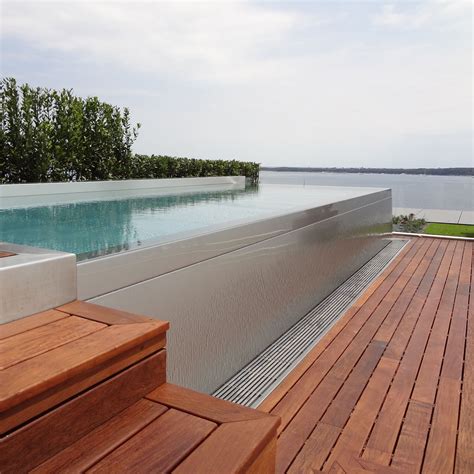 One-piece swimming pool - Steel And Style - overflow / lap / custom