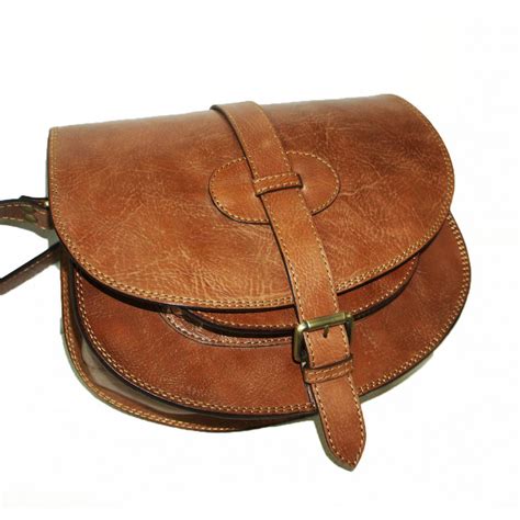 hush dana leather cross body saddle bag tan  barbara fowler blog