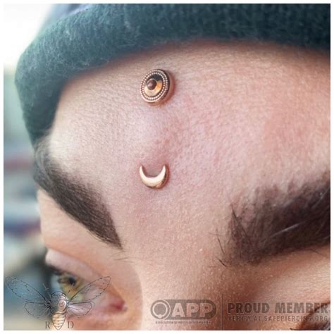 Alchemy adornment vertical bridge piercing | Unusual piercings ...