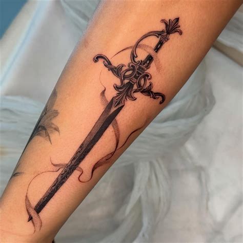 creative sword tattoos  symbolize courage sacred joanne