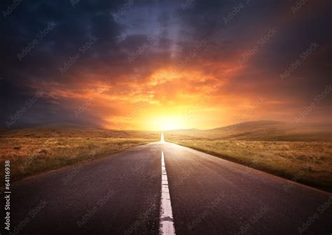 Road Leading Into A Sunset Stock Photo | Adobe Stock